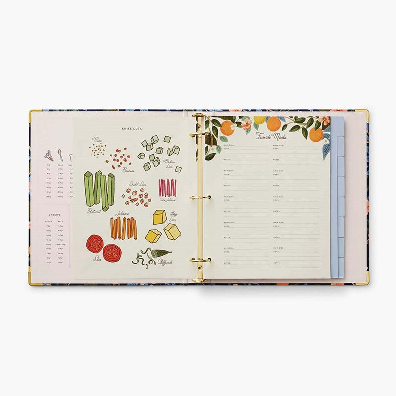 Recetario Citrus Grove de Rifle Paper Co. abierto, con diseño floral, detalles dorados y separadores.