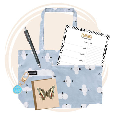 Imagine Box 03 Billy Paper gift set with stylish accessories and stationery items, including a canvas tote, planner, pen, keychain, and illustrated postcard.