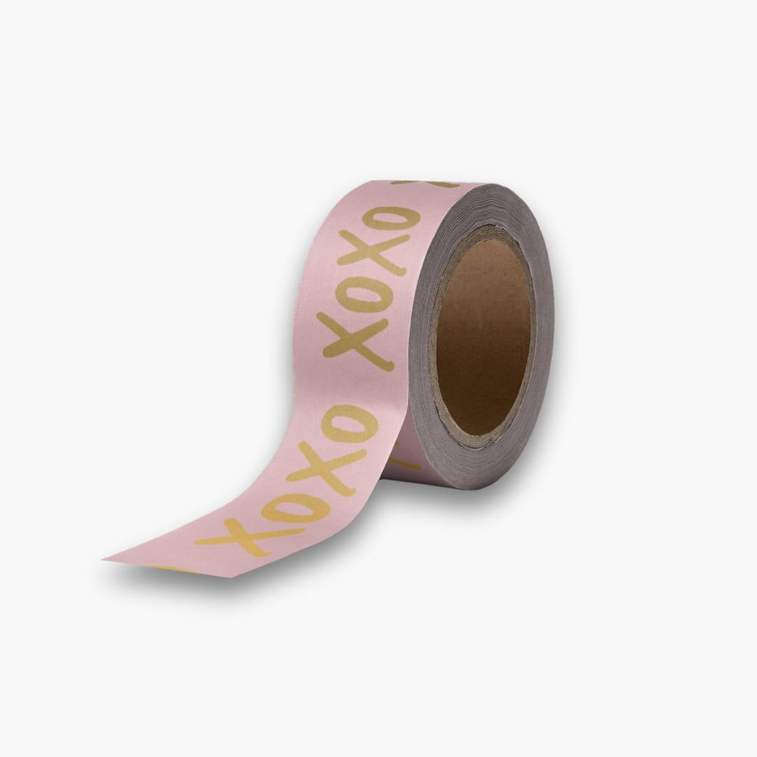 Cinta Decorativa Washi Tape XoXo con diseño dorado metálico sobre fondo rosa.